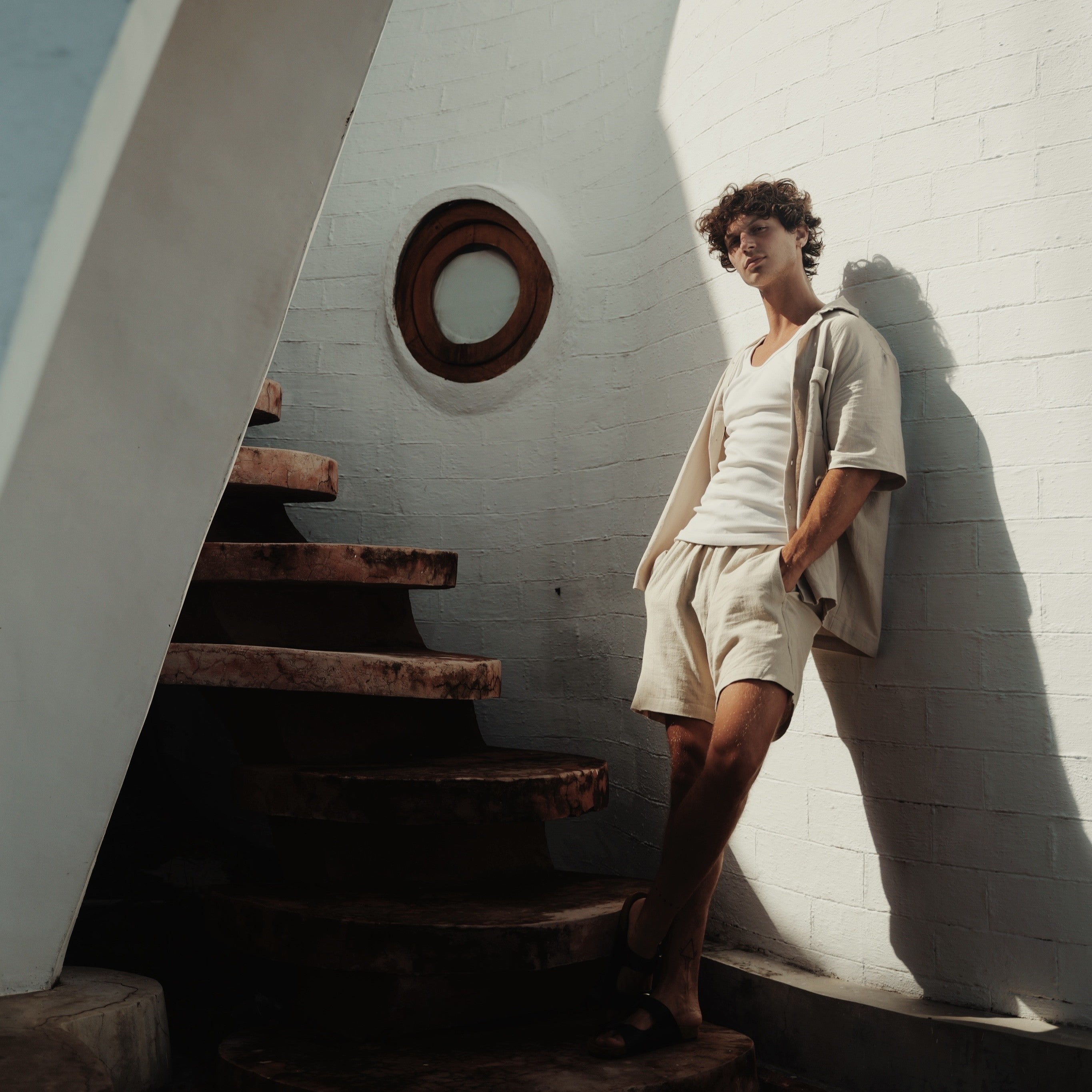 alt="Clean outfit for men featuring essential pieces."