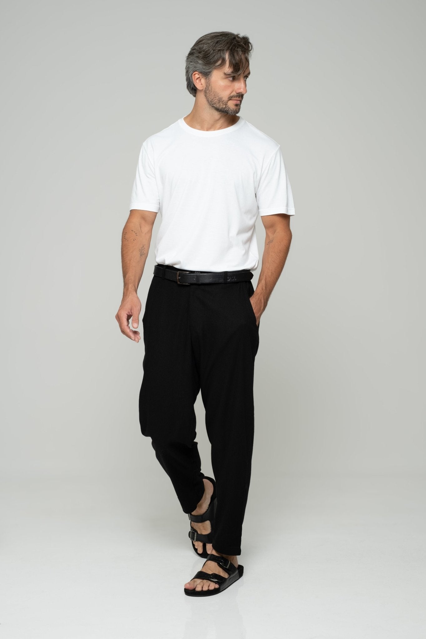 alt="Side view black linen pants, mid-rise, wide leg, breathable summer linen."