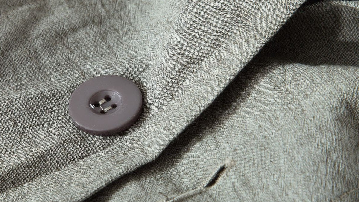 alt="Off-duty men's look styled with relaxed pieces."