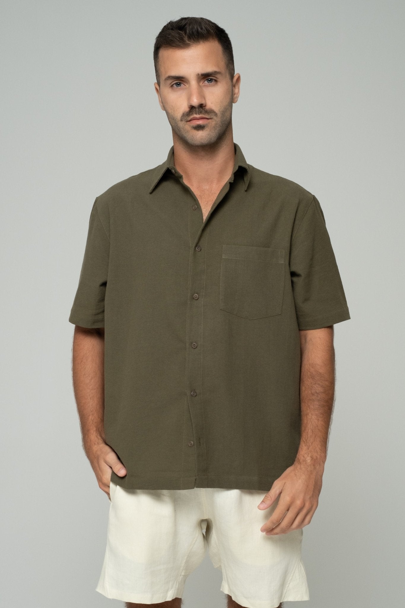 alt="Sierra olive Origin short-sleeve shirt, breathable cotton, regular fit, front button view."