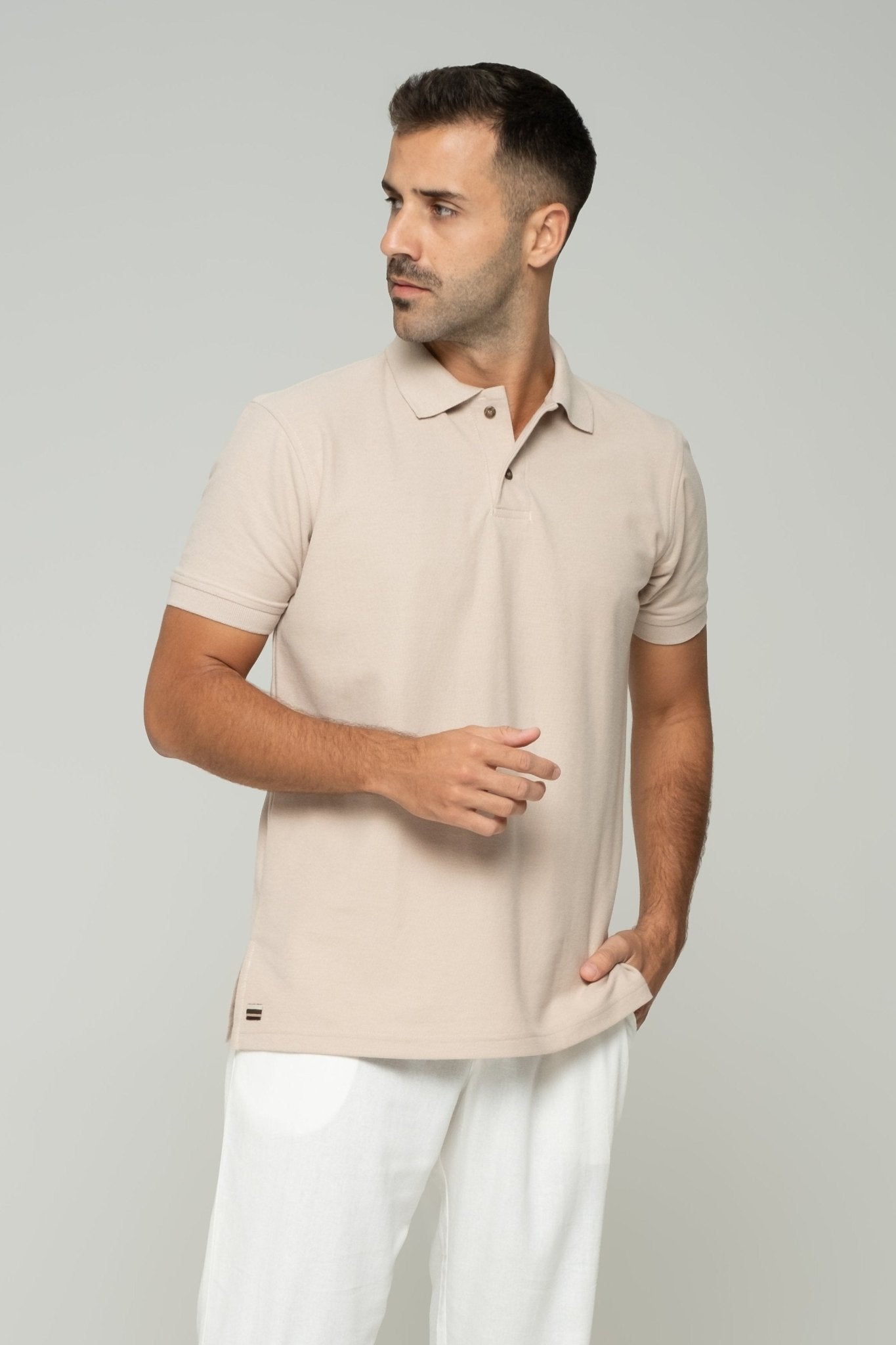 alt="Front view ASASI cream polo shirt in breathable cotton pique, tailored regular cut for men's casual wardrobe."