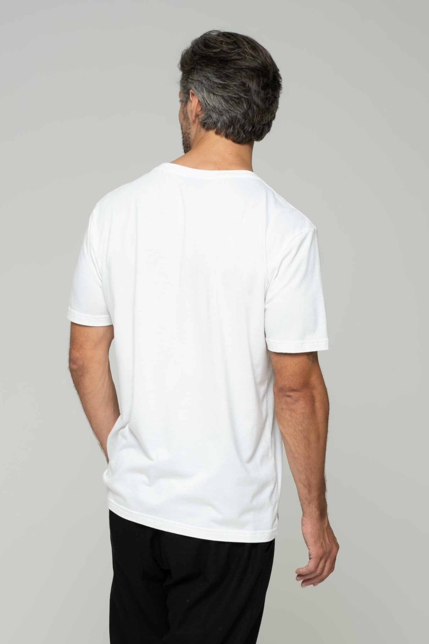 alt="Vāyu classic fit t‑shirt in off‑white, bamboo-cotton crew-neck with curved hem."