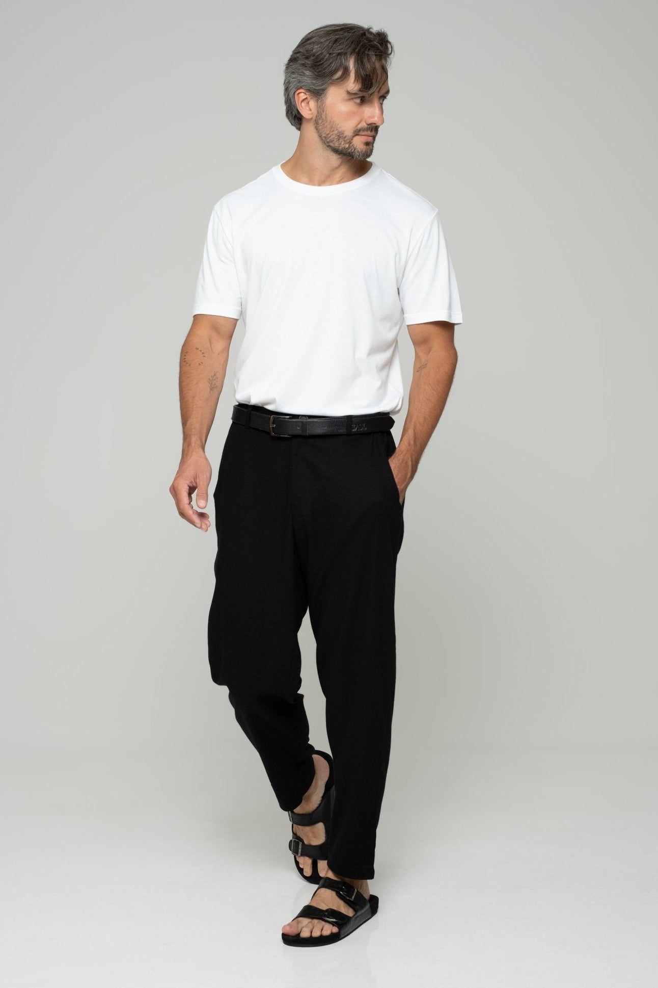 alt="Side view black linen pants, mid-rise, wide leg, breathable summer linen."

